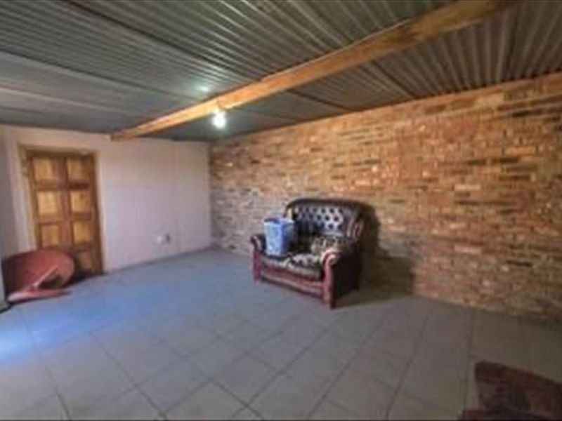 Cozy Two-Bedroom Home with Practical Layout - Photo 3