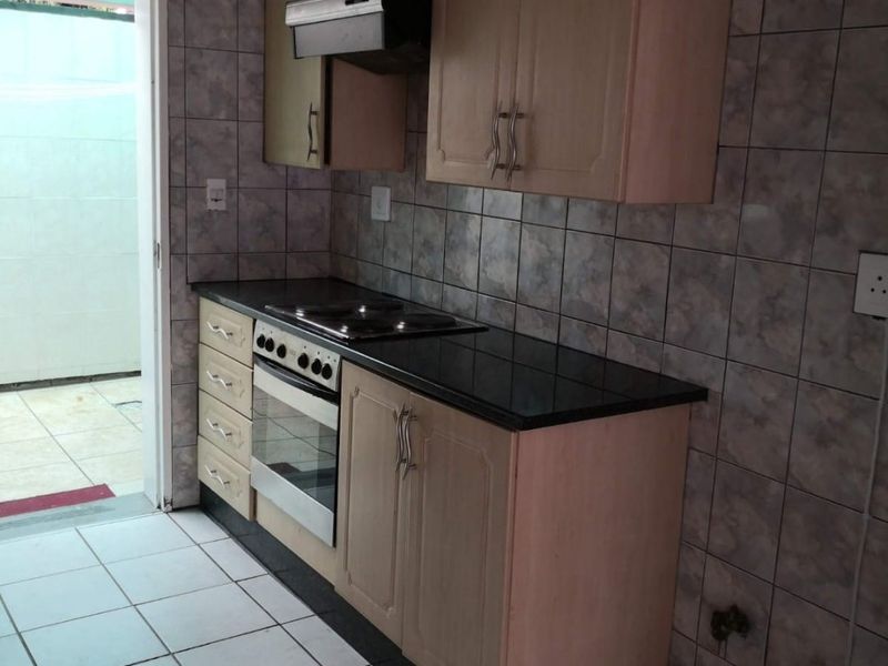 This spacious duplex is situated in a highly secure complex.  - Photo 6