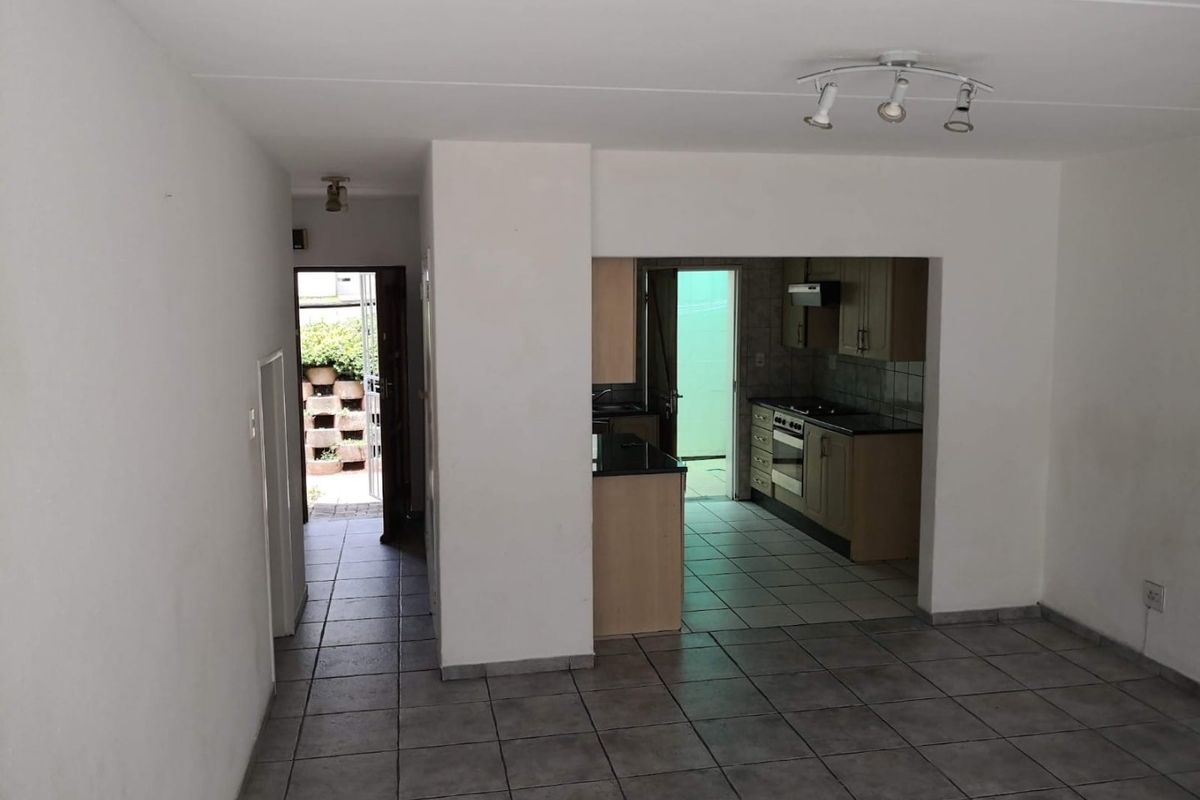 This spacious duplex is situated in a highly secure complex.  - Photo 4