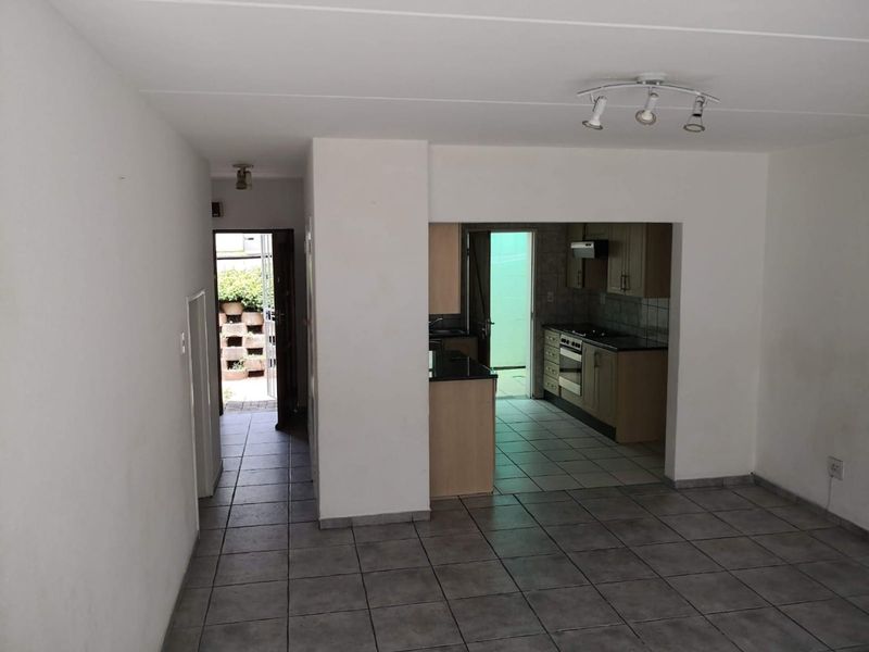 This spacious duplex is situated in a highly secure complex.  - Photo 4