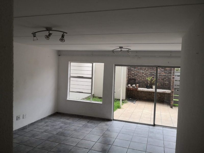 This spacious duplex is situated in a highly secure complex.  - Photo 7