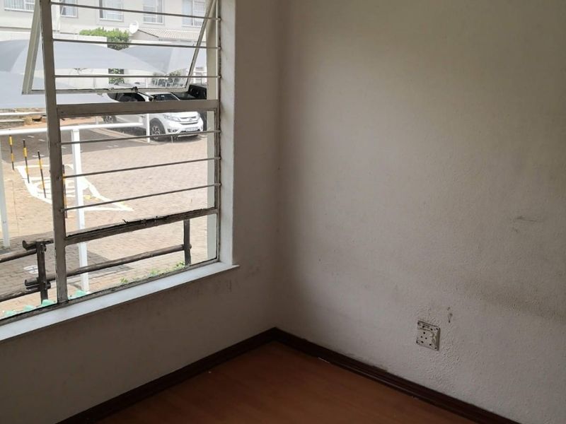 This spacious duplex is situated in a highly secure complex.  - Photo 9