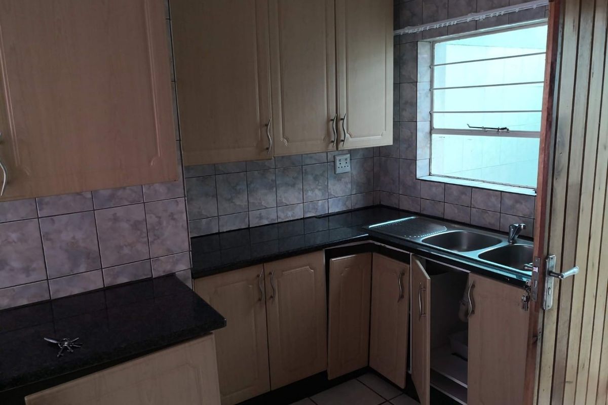 This spacious duplex is situated in a highly secure complex.  - Photo 5