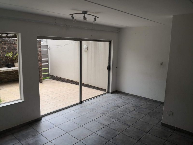 This spacious duplex is situated in a highly secure complex.  - Photo 8