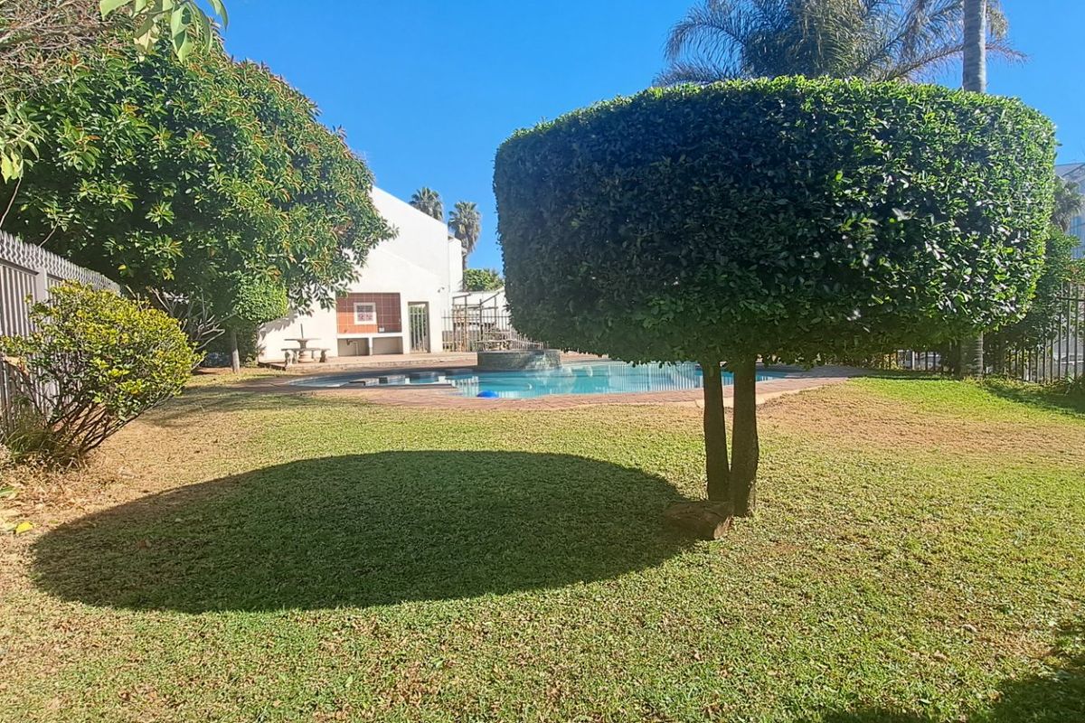 This spacious duplex is situated in a highly secure complex.  - Photo 2