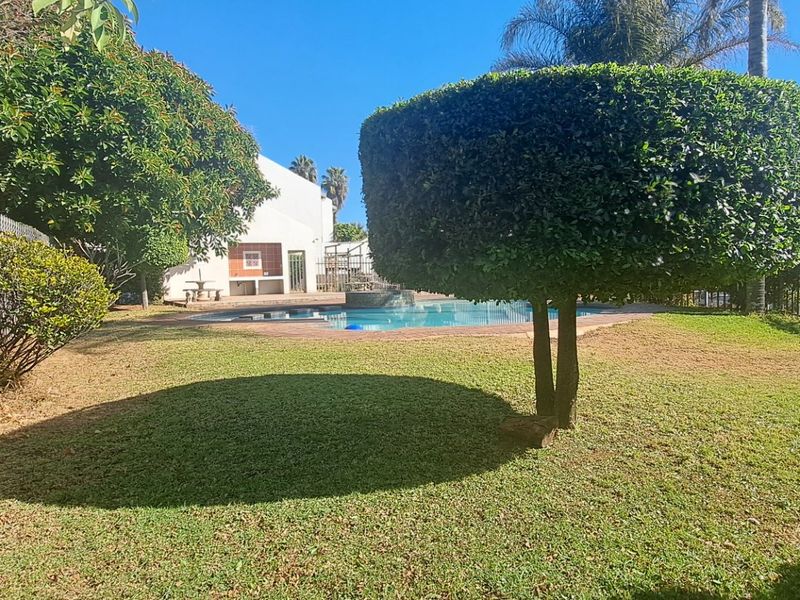 This spacious duplex is situated in a highly secure complex.  - Photo 2