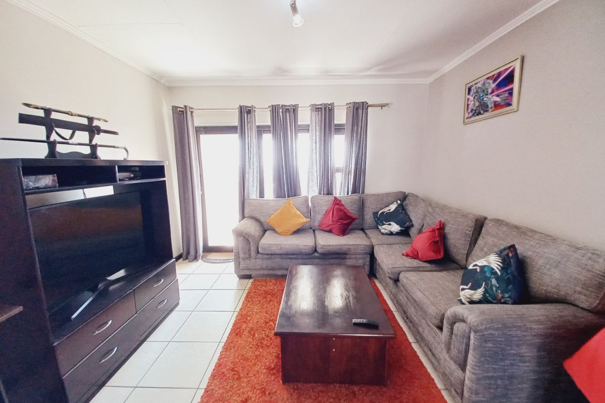 Top-Floor Acacia Gem with Panoramic Balcony Views, Resort-Style Amenities, and Unbeatable Greenstone Convenience1 - Photo 2