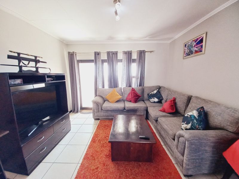 Top-Floor Acacia Gem with Panoramic Balcony Views, Resort-Style Amenities, and Unbeatable Greenstone Convenience1 - Photo 2