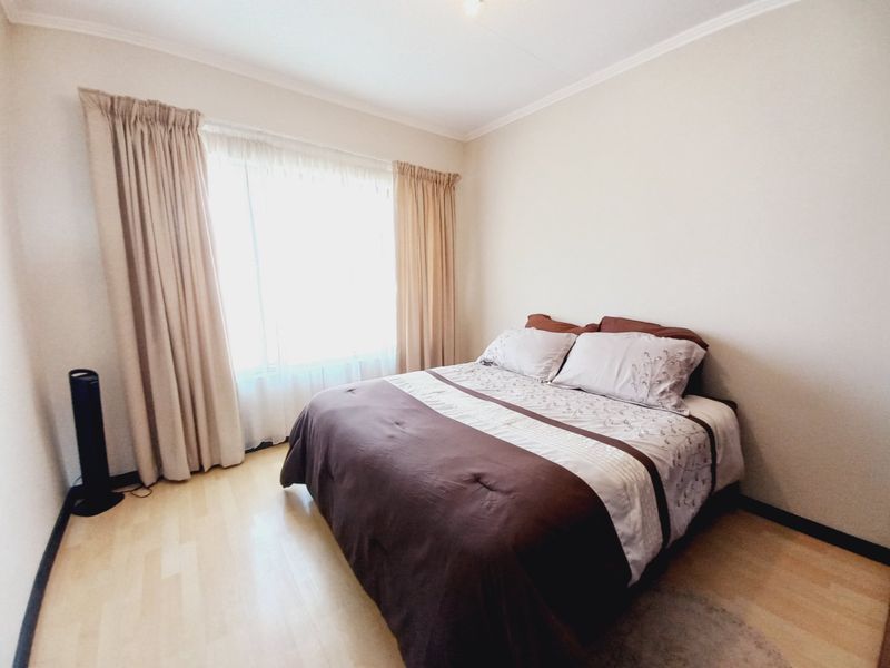 Top-Floor Acacia Gem with Panoramic Balcony Views, Resort-Style Amenities, and Unbeatable Greenstone Convenience1 - Photo 9