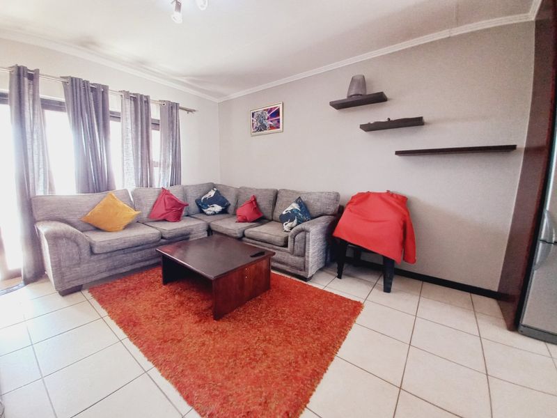 Top-Floor Acacia Gem with Panoramic Balcony Views, Resort-Style Amenities, and Unbeatable Greenstone Convenience1 - Photo 3