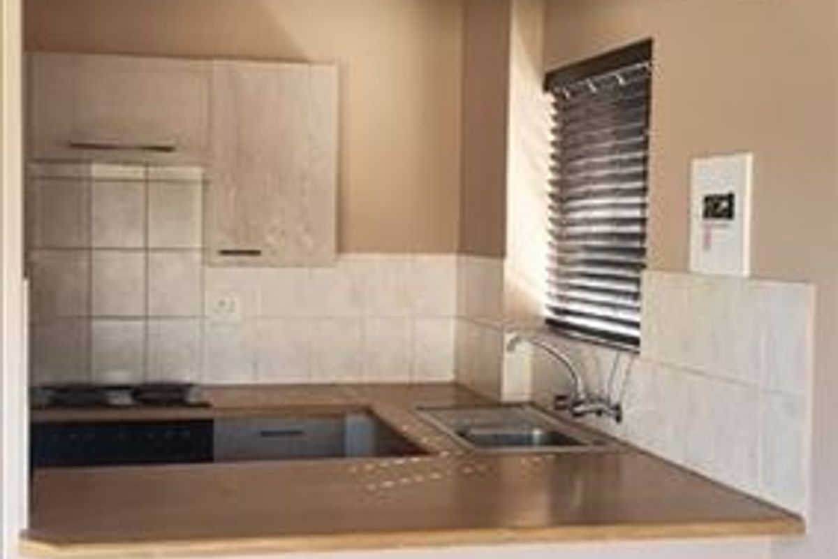 Neat Two-Bedroom Home with Pool and Carport - Photo 2