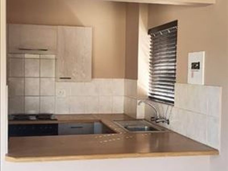 Neat Two-Bedroom Home with Pool and Carport - Photo 2