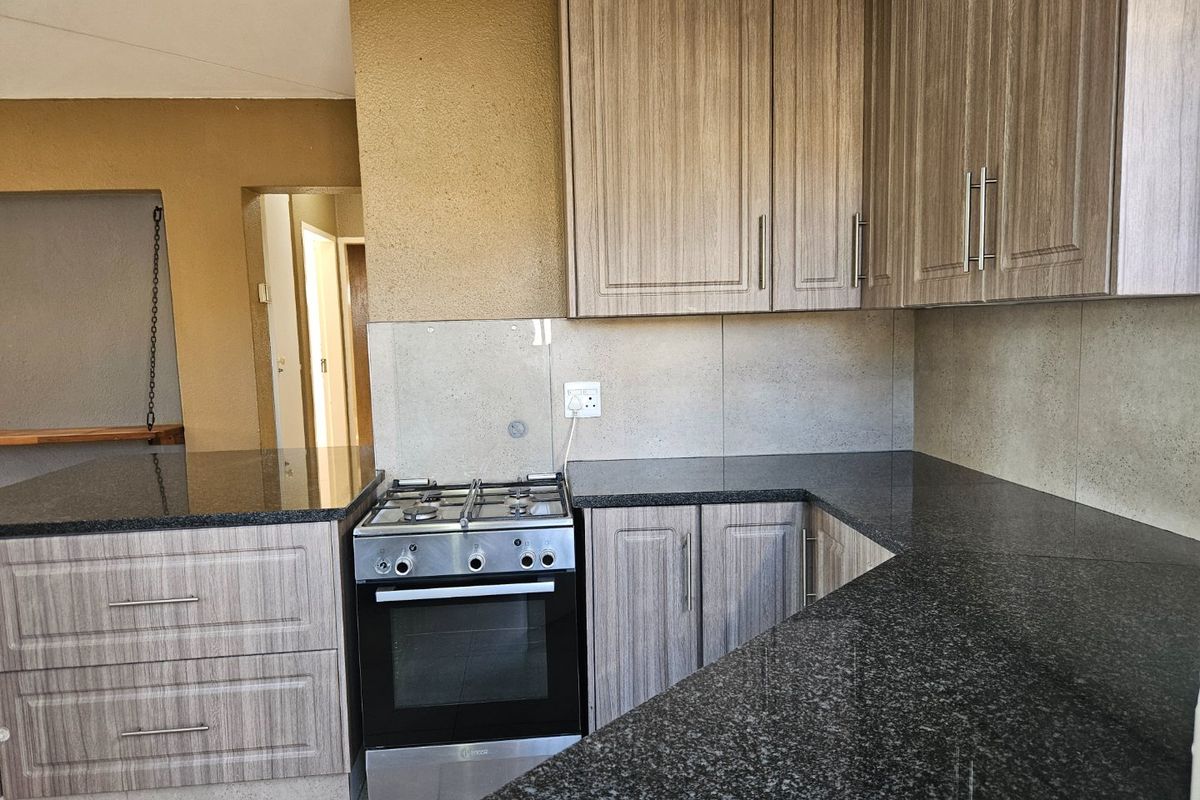 Stylish & Secure 3-Bedroom Free-Title Home for Sale!!! - Photo 5