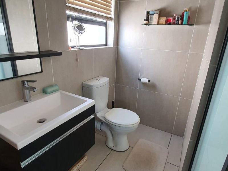 Modern 2-Bed, 2-Bath Gem with Appliances & Top-Tier Security in Greenstone Ridge - Photo 9