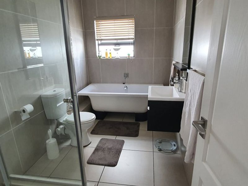 Modern 2-Bed, 2-Bath Gem with Appliances & Top-Tier Security in Greenstone Ridge - Photo 8