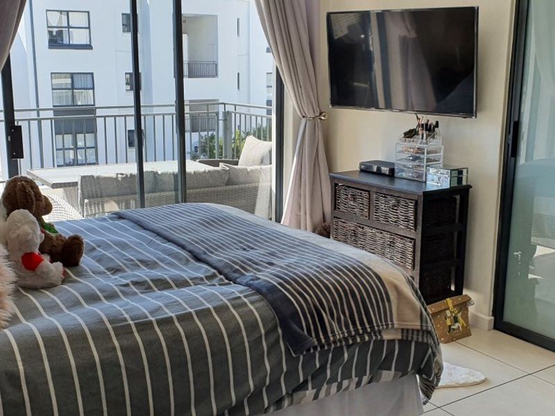 Modern 2-Bed, 2-Bath Gem with Appliances & Top-Tier Security in Greenstone Ridge - Photo 6