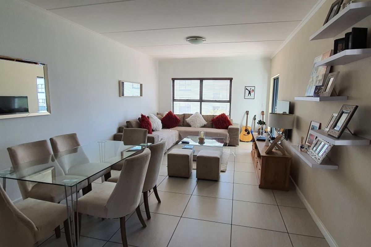 Modern 2-Bed, 2-Bath Gem with Appliances & Top-Tier Security in Greenstone Ridge - Photo 4