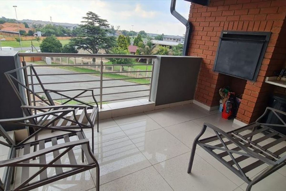 Comfortable Three-Bedroom Home with Carport - Photo 3