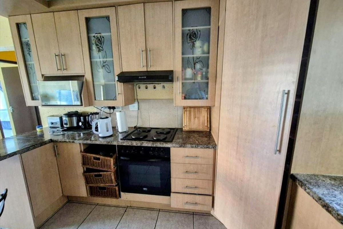 Neat Two-Bedroom Home with Pool and Double Carport - Photo 2