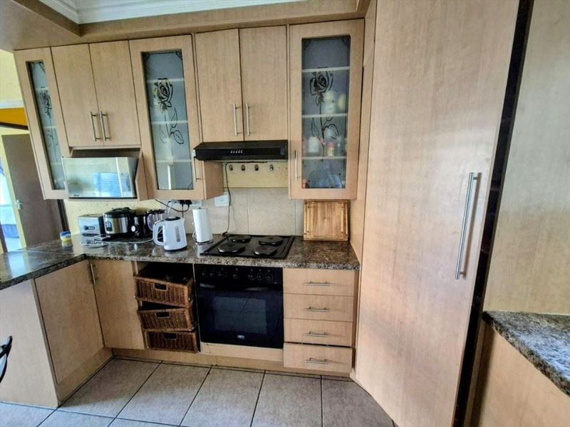 Neat Two-Bedroom Home with Pool and Double Carport - Photo 2