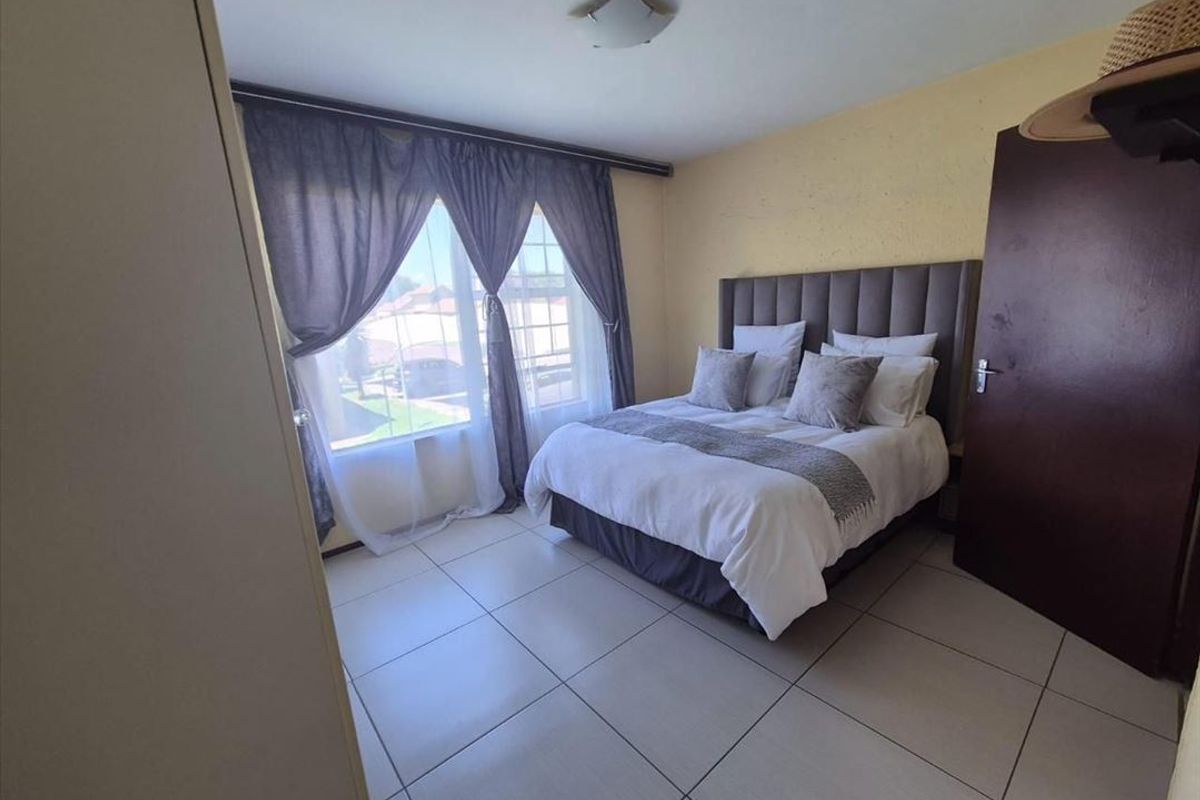 Neat Two-Bedroom Home with Pool and Double Carport - Photo 3