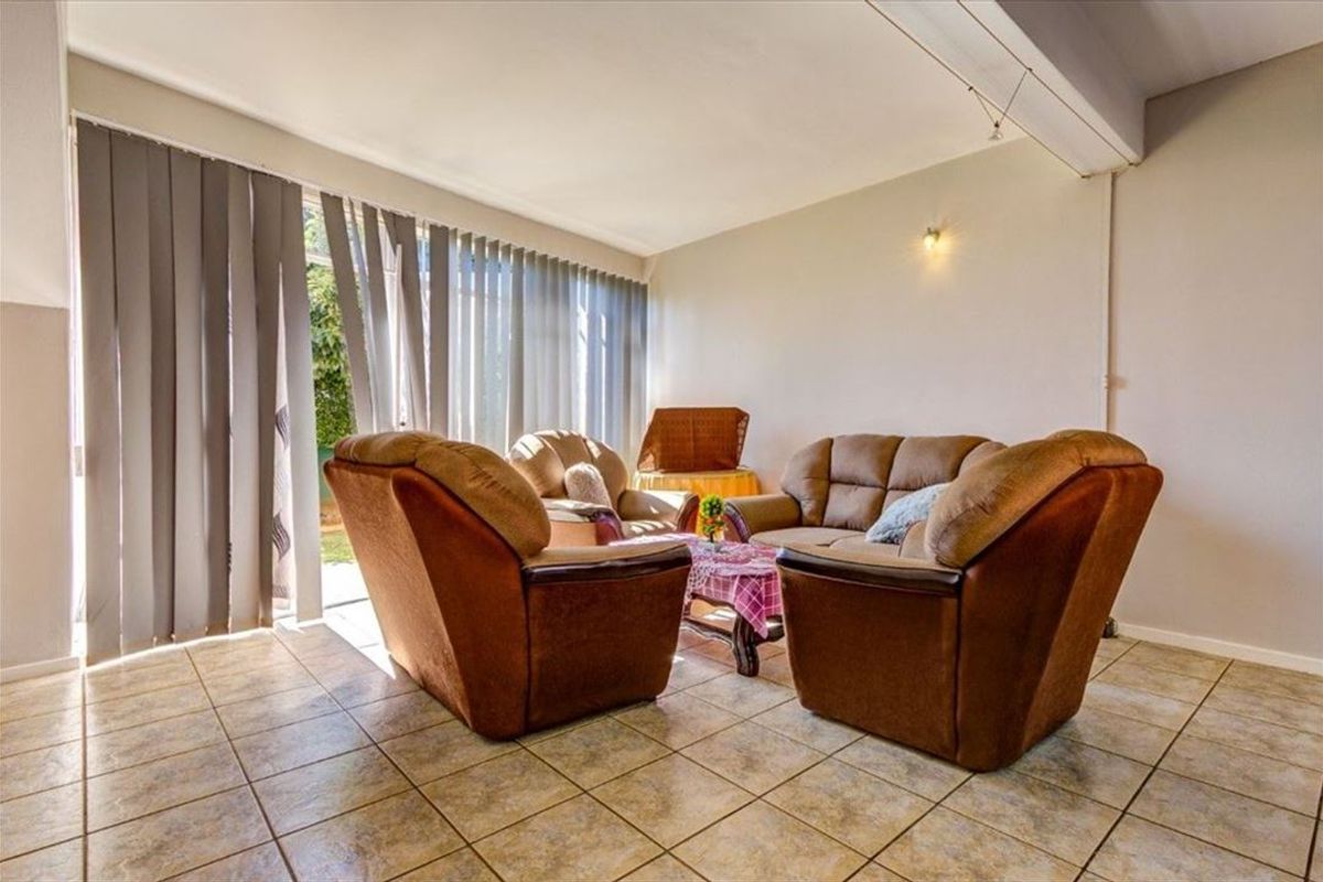 Charming Two-Bedroom Home with Garage and Pantry - Photo 2