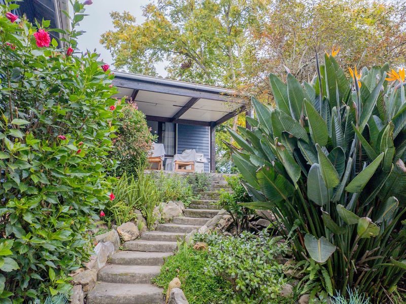 Inviting Wooden Home with Lush Garden & Separate Flat - Photo 6