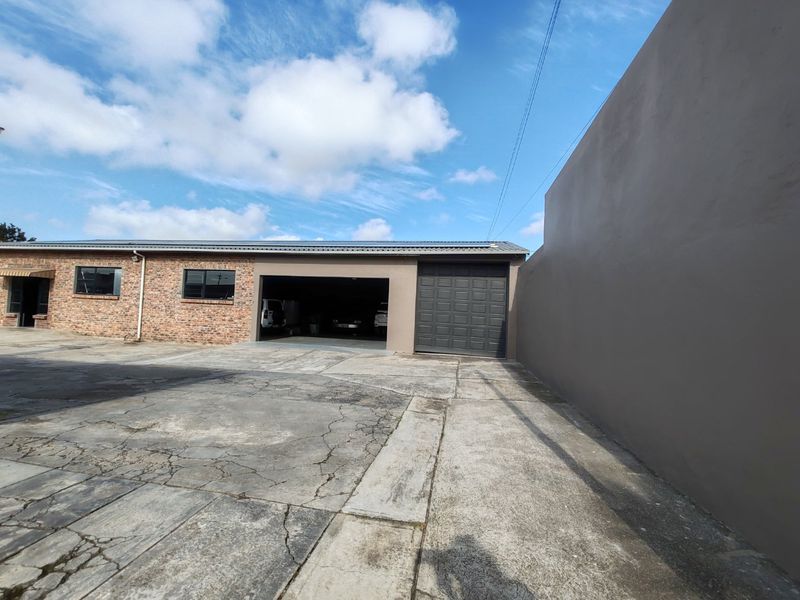 Versatile Commercial & Residential Property with Workshops, Offices, and Income Potential - Photo 2