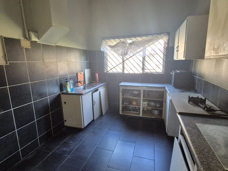 PRICED TO GO - INVEST AND EARN - Photo 8