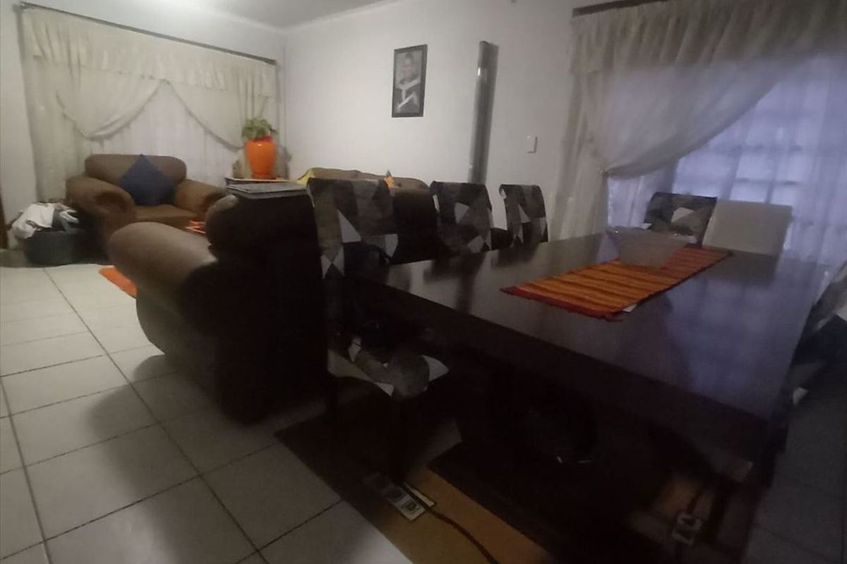Comfortable Three-Bedroom Home with Garage - Photo 2