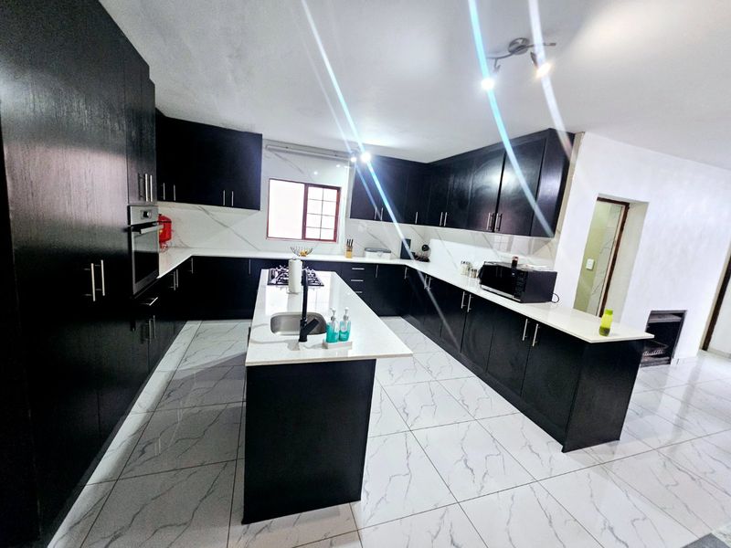 Modern 4 Bedroom 2.5 Bathroom House + Heated Pool for Sale in Silverstone Country Estate - Photo 7