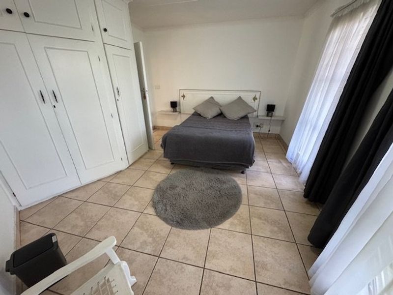 Spacious Five-Bedroom Family Retreat with Pool - Photo 8