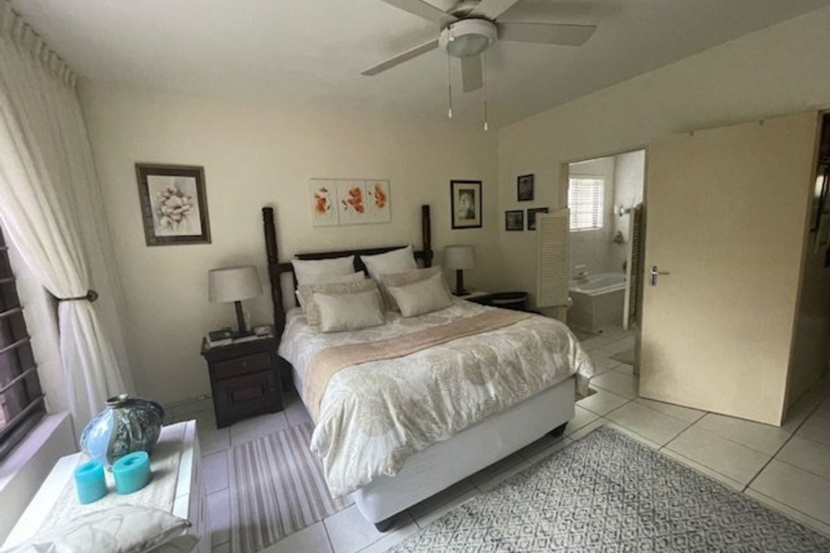 Spacious 4-Bedroom Ground Floor Corner Unit in Tranquil Uvongo Setting - Photo 5