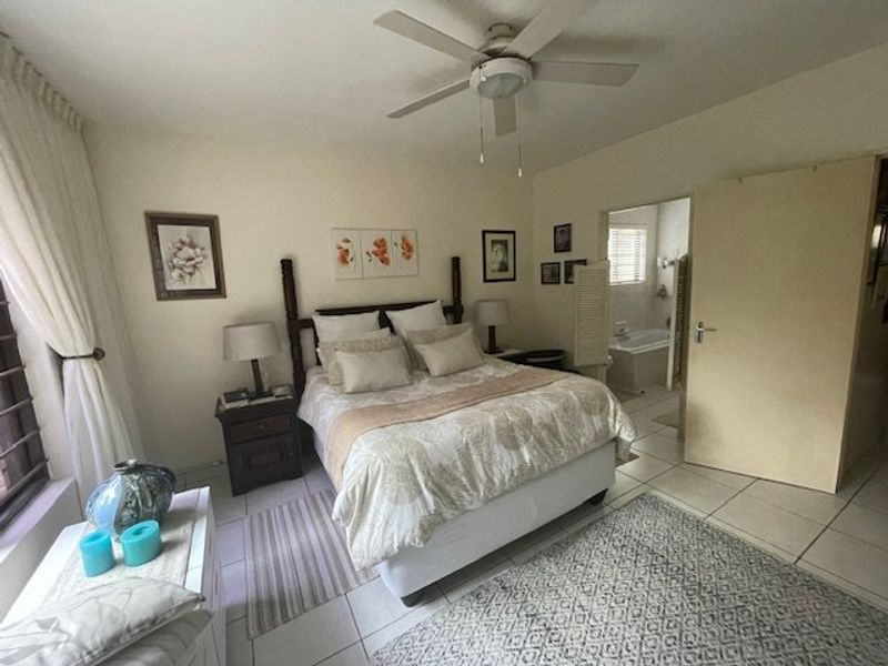 Spacious 4-Bedroom Ground Floor Corner Unit in Tranquil Uvongo Setting - Photo 5