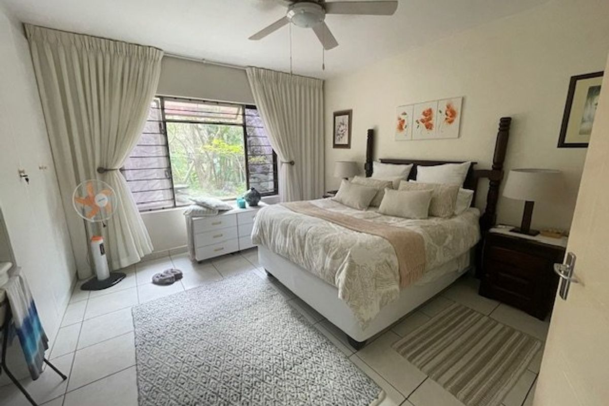 Spacious 4-Bedroom Ground Floor Corner Unit in Tranquil Uvongo Setting - Photo 3