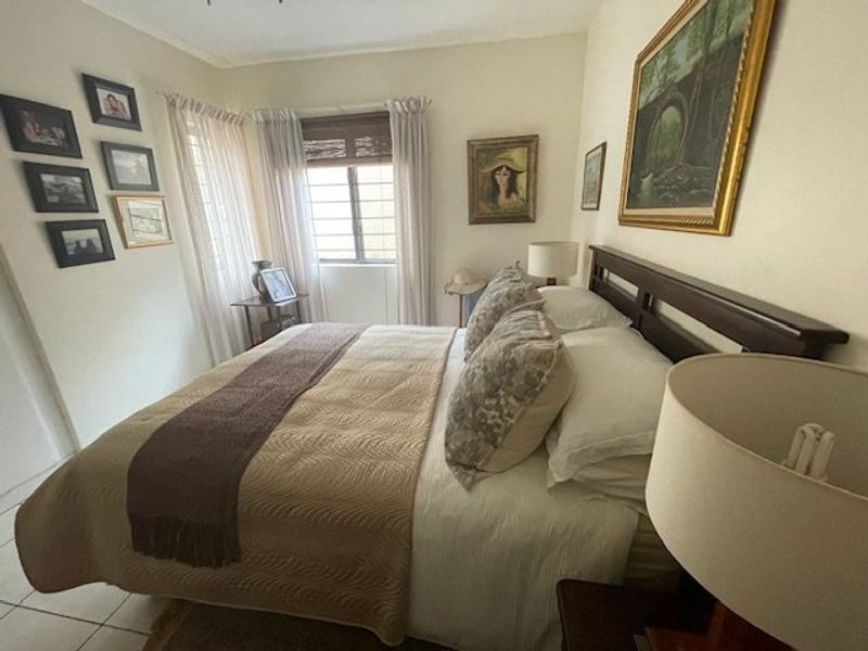 Spacious 4-Bedroom Ground Floor Corner Unit in Tranquil Uvongo Setting - Photo 10