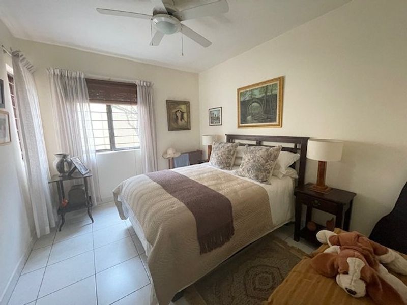 Spacious 4-Bedroom Ground Floor Corner Unit in Tranquil Uvongo Setting - Photo 9