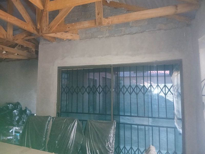 Spacious Family Home with Additional Backrooms - Photo 9