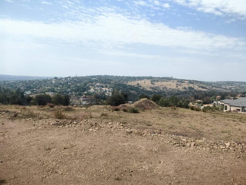 An elevated view overlooking the surrounding landscape and residential neighborhood.