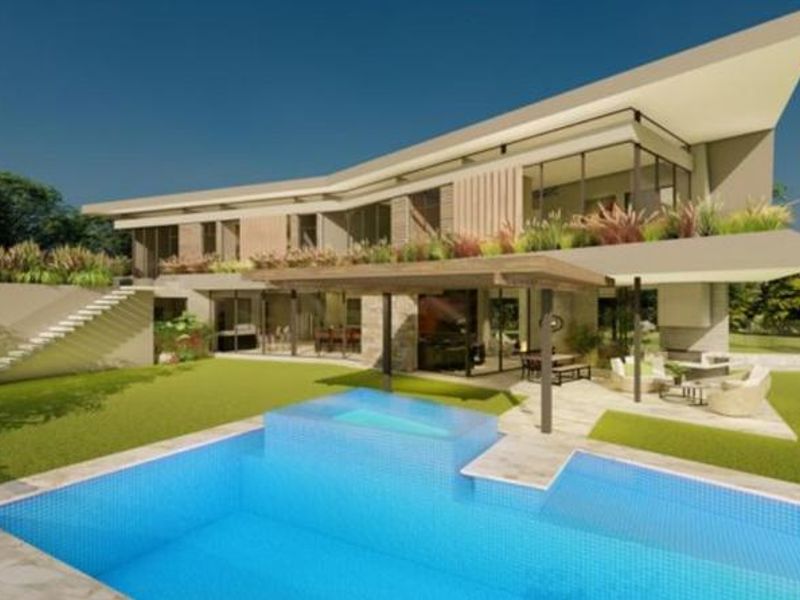 Modern architectural rear elevation featuring a swimming pool, covered patio area, and landscaped garden with contemporary design elements.