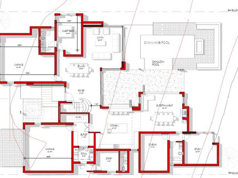 Architectural floor plan showing the layout of the residence, including living areas, bedrooms, kitchen, garages, and outdoor pool space.