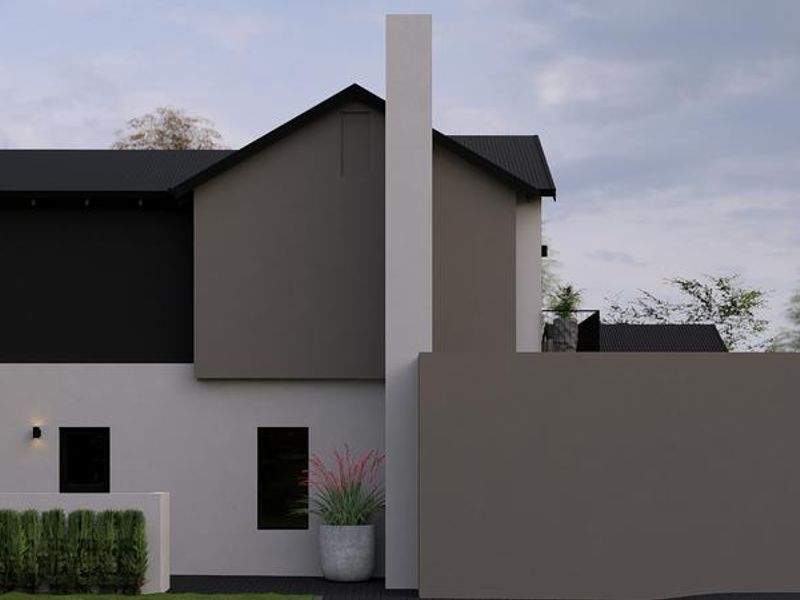 A modern two-story residential exterior featuring a contemporary color palette, prominent chimney stack, and clean architectural lines.