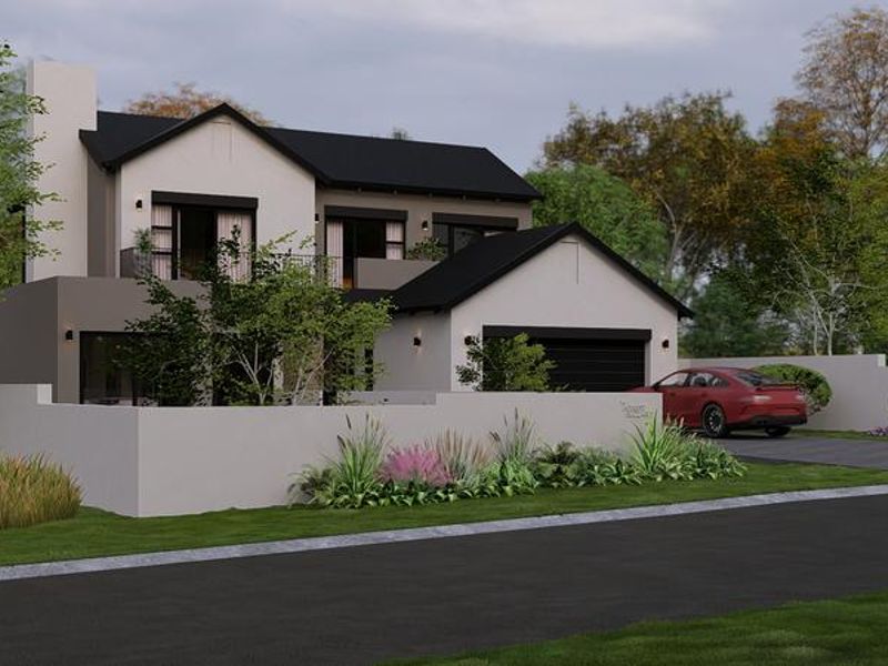 A modern double-storey residential property featuring a pitched roof, integrated garage, and a clean, contemporary facade with a front boundary wall.