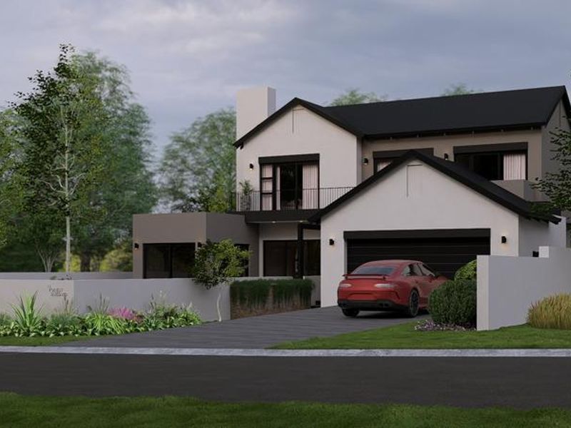 A modern double-storey residential property featuring a pitched roof, balcony, integrated garage, and a landscaped front garden with a paved driveway.
