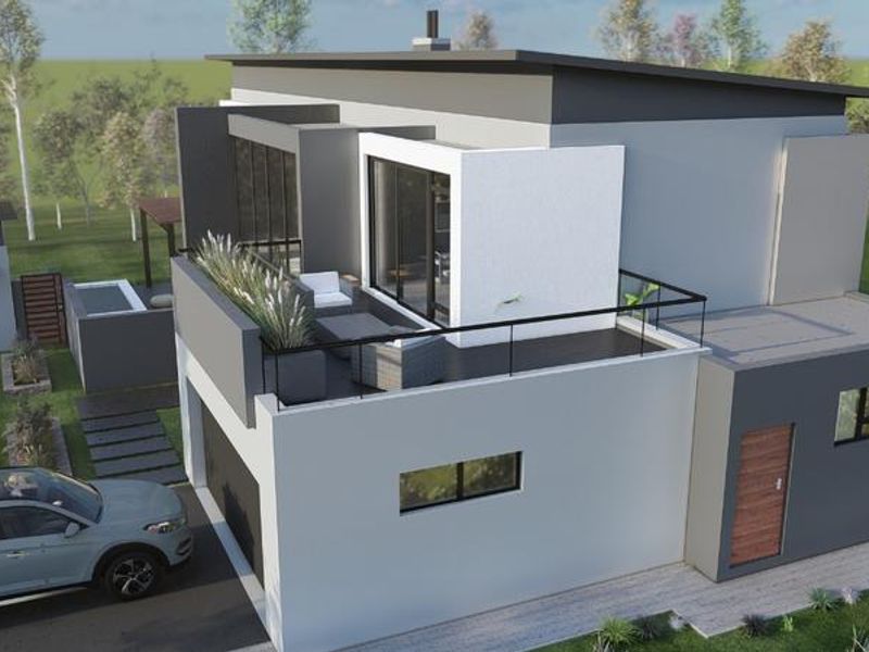 An aerial perspective of a modern two-story house featuring a flat roof, a spacious upper-level balcony with glass railings, and an attached garage.
