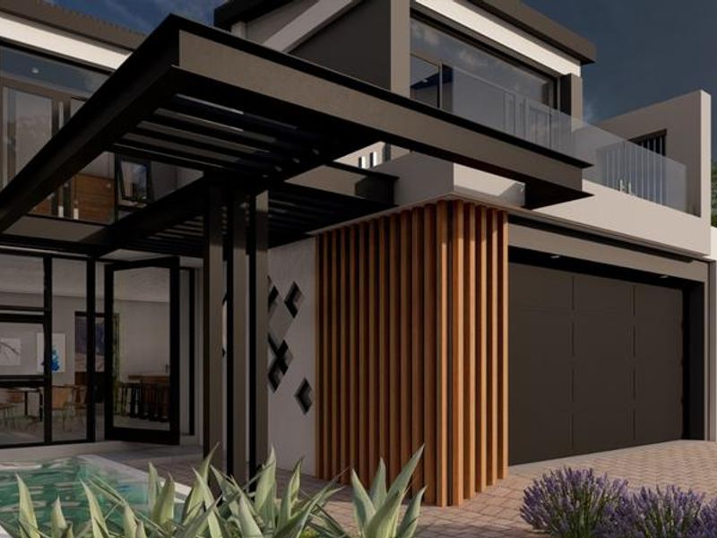 Modern architectural front facade featuring a steel pergola, timber slat accents, glass balcony railing, and a double garage.