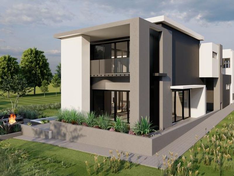 A modern two-story residential property featuring clean architectural lines, large sliding glass doors, a paved patio area, and a contemporary exterior finish.