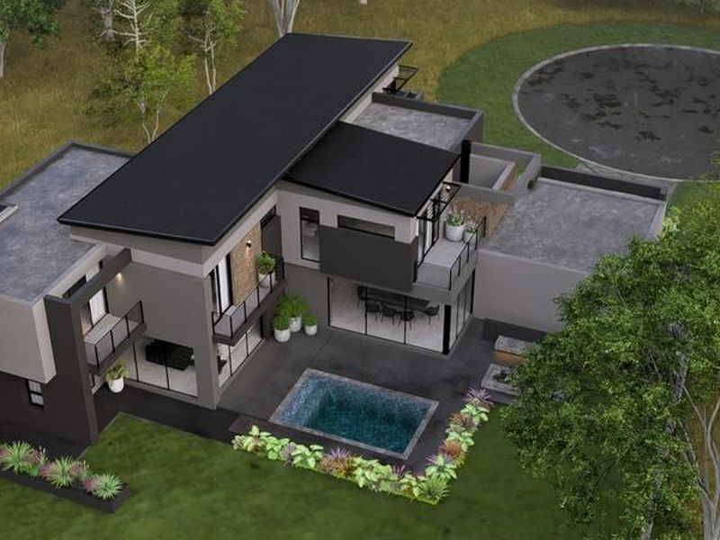Aerial view of a modern two-story residence featuring a flat roof, private swimming pool, paved patio area, and landscaped garden surroundings.