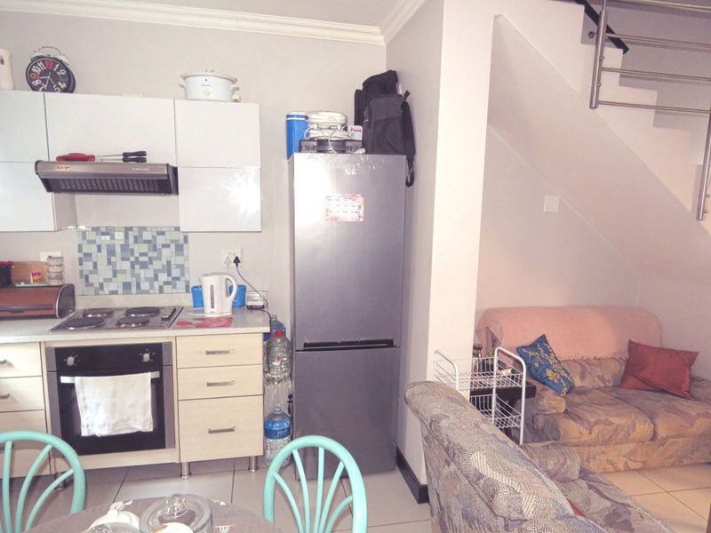 Townhouse For Sale in Rooihuiskraal North - Photo 6