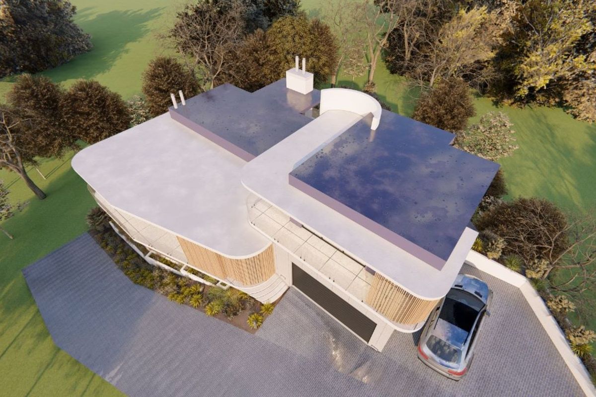 An aerial view of a modern residential property design featuring a flat roof, integrated garage, and contemporary architectural detailing.